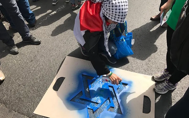 Moroccans Protest Israeli Actions at Jerusalem Mosque, Burn Flag in Rabat
