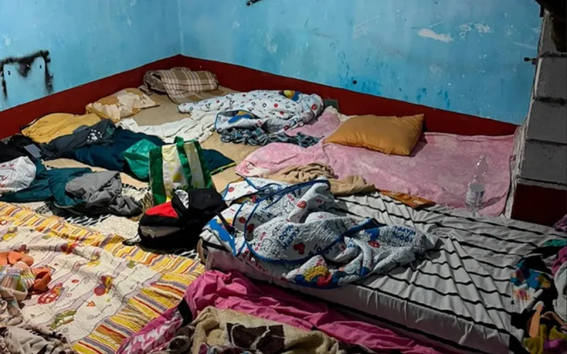 Police find 74 migrants crammed into Ceuta home, including two hidden in a fridge