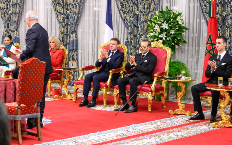Brigitte Macron Dons Red Coat in Nod to Moroccan Flag During State Visit