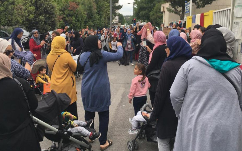 French Education Official Exits School Over Veiled Women, Sparking Secularism Debate