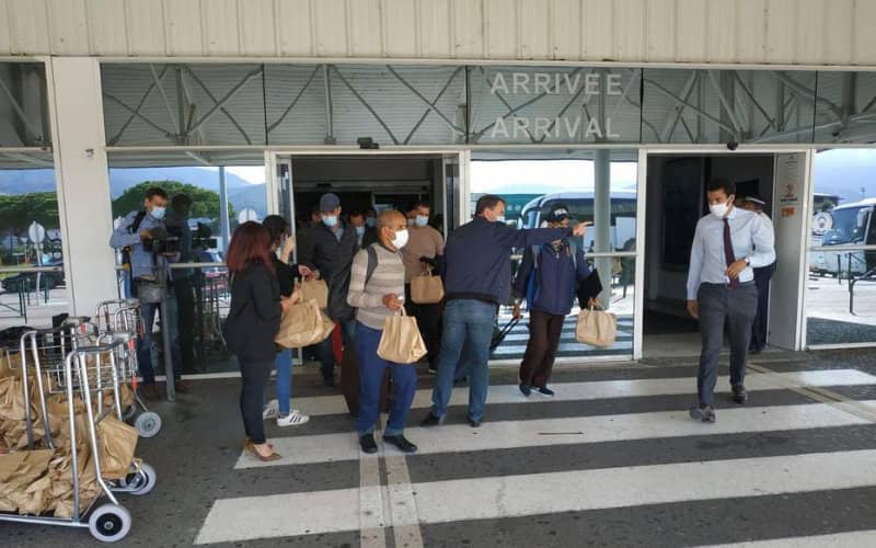 Moroccan Seasonal Workers Arrive in Corsica for Clementine Harvest Amid Pandemic Challenges