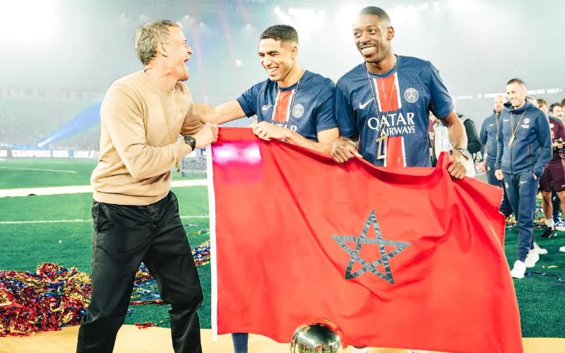 PSG Stars Hakimi, Dembélé, and Coach Luis Enrique Celebrate Ligue 1 Title with Moroccan Flag