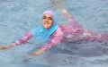 Activists in Burkinis Protest Paris Pool Ban, Causing Closure