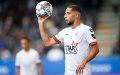Belgian Footballer Sofian Kiyine Hospitalized After Dramatic Car Crash into Sports Hall