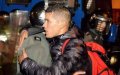 Brothers Divided: Moroccan Photo Captures Tension Between Protesters and Security Forces