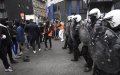 Brussels Riots: Federal Policewoman Rescued by Local Resident During Violent Protest