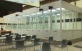Brussels Terror Trial: Court Orders Removal of Controversial Defendant Boxes