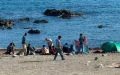 A food distribution turns into police charges and tear gas in Ceuta
