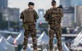 French Military Calendar Sparks Debate Over Inclusion of Veiled Woman