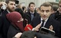 Macron's Speech on 'Islamist Separatism' Overshadowed by Veiled Woman Photo Controversy