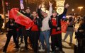Moroccan Fans Celebrate World Cup Advancement with Peaceful Rally on Paris' Champs-Élysées