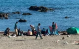 A food distribution turns into police charges and tear gas in Ceuta