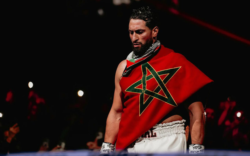 Ben Saddik Advances in Heavyweight Tournament Despite Injury