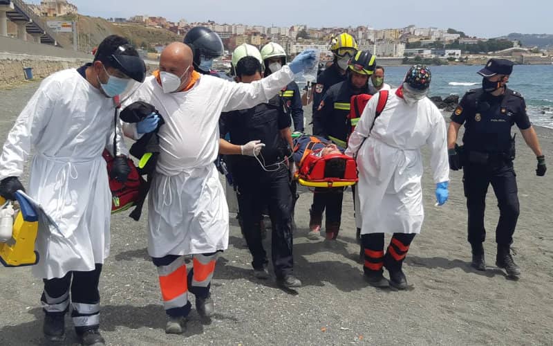 Desperate Migrant's Suicide Attempt Thwarted on Ceuta Beach Amid Border Crisis