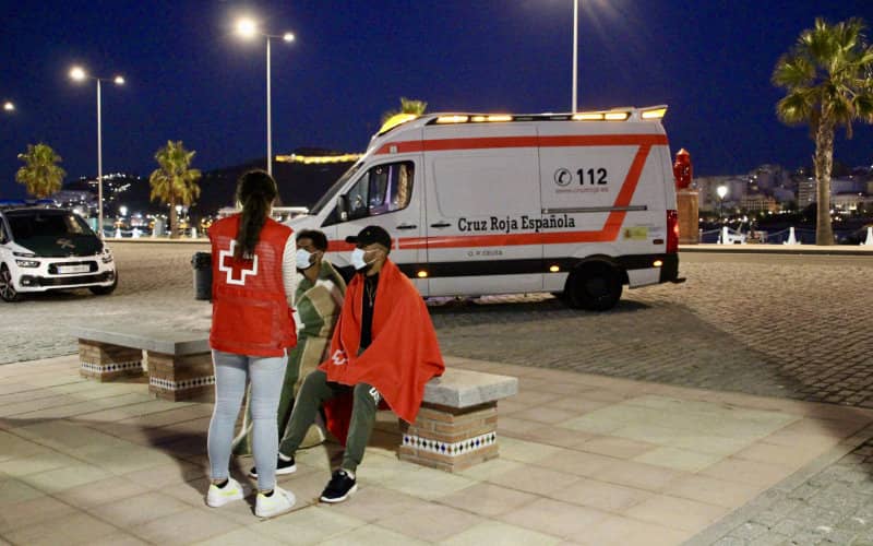 Exhausted Moroccan Migrant Rescued from Sea Near Ceuta