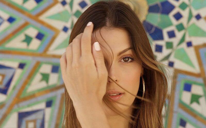 Former Miss Universe Sparks Controversy with Mosque Photo in Morocco