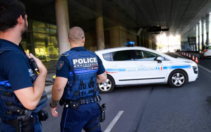 Macron Vows Crackdown on Online Extremism After Teacher Attack