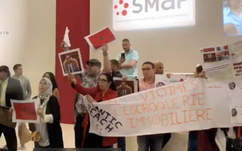 Moroccan Expats Protest Real Estate Fraud at Paris Property Expo
