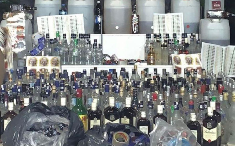 Police Bust Counterfeit Alcohol Ring in Agadir, Three Arrested