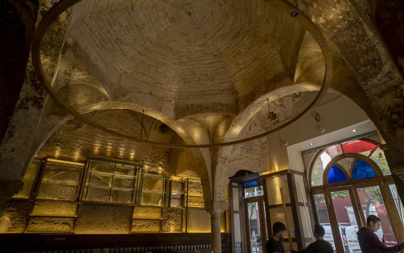 Rare 12th-Century Islamic Bath with Complete Decor Uncovered in Seville Bar