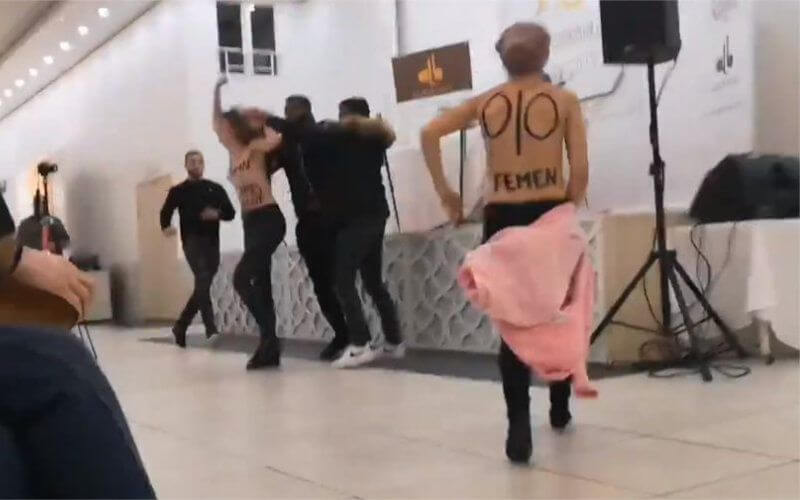 Topless Femen Protesters Disrupt Tariq Ramadan's Islamic Conference in France