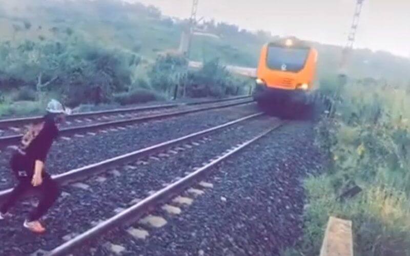 Viral Video Shows Reckless Teen Dodging High-Speed Train in Dangerous Stunt