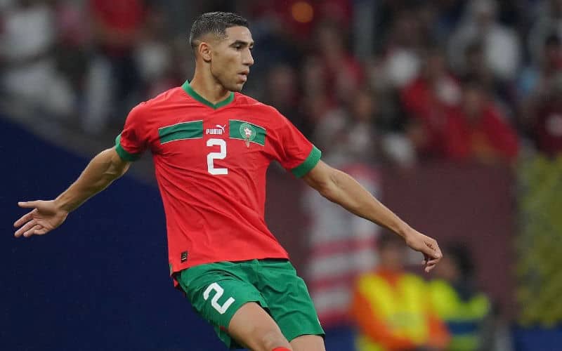World Cup Speedsters Clash: Morocco's Hakimi vs Canada's Davies in Group Stage Showdown